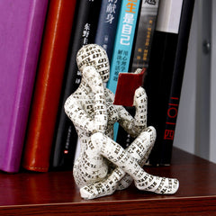 Reading Woman Figurine